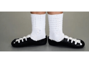 Example of irish dancer showing turnout wearing soft shoes ghillies