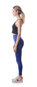 blonde irish dancer showing good posture wearing blue yoga pants and black crop top